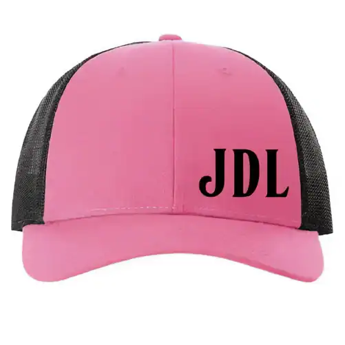 Pink and black trucker cap with embroidered JDL initials for a stylish look.